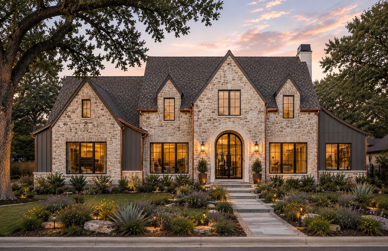 Concept rendering of a European-inspired stone home with an arched entry